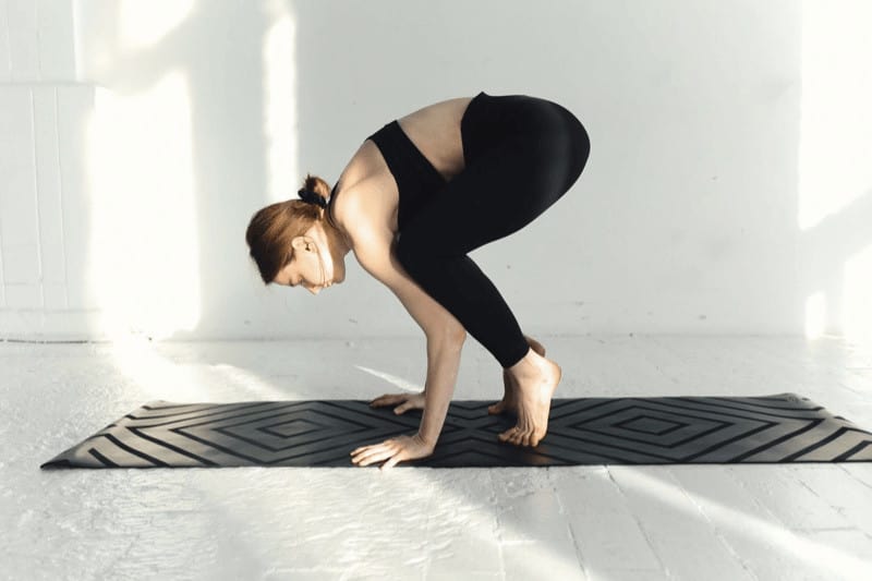 The squatting position of Prayer Pose makes it a great warm-up or even prerequisite for the arm-balancing crow pose, among others.