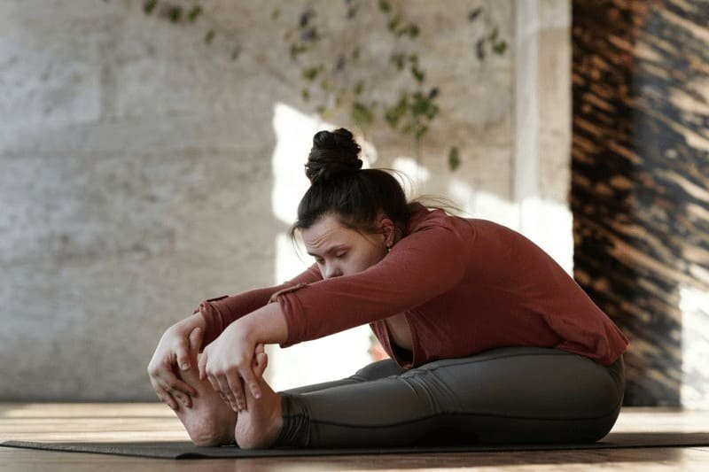 Any forward bending posture, like the Seated Forward Bend, is a wonderful counter pose after the backbend of Seal.